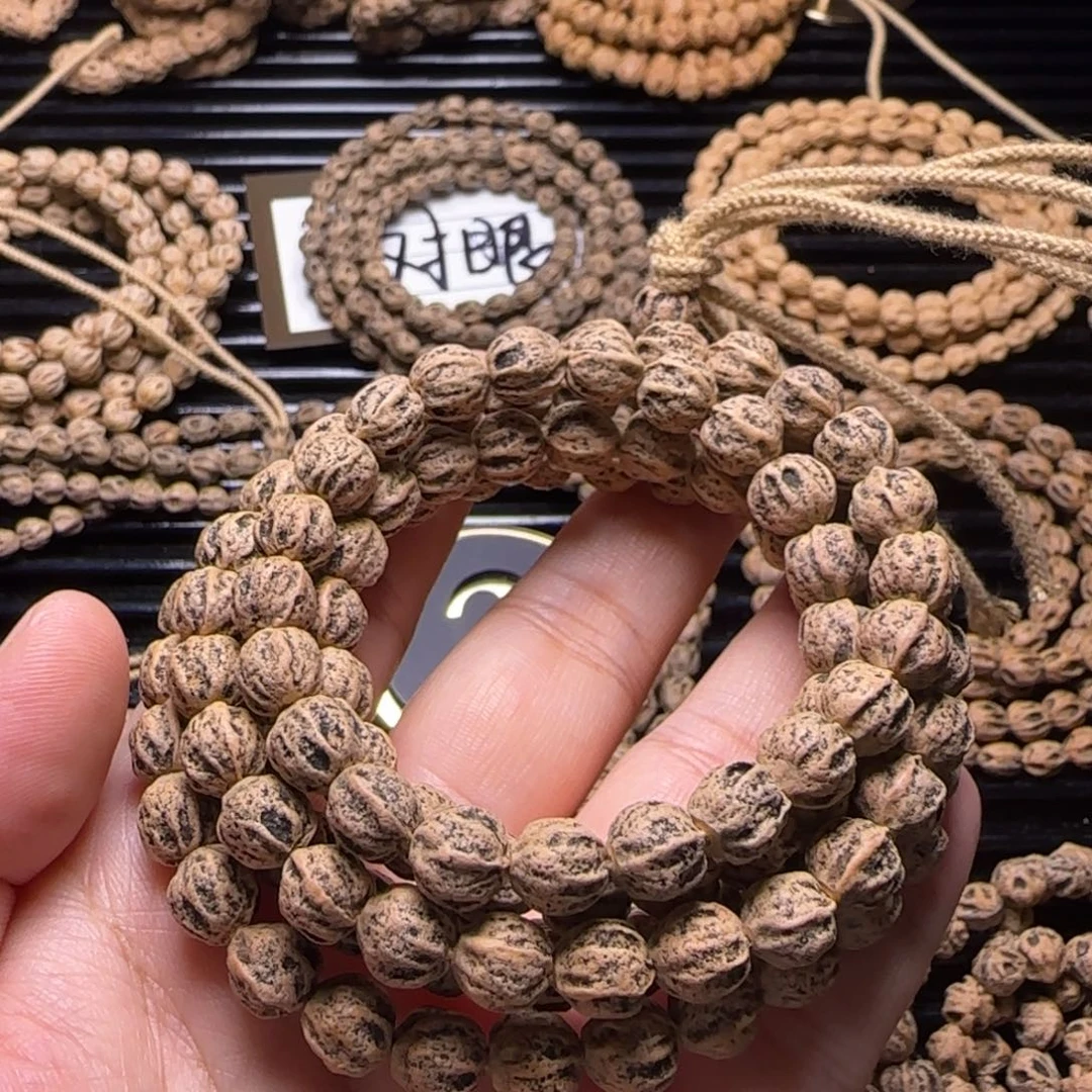 爱***己柏香籽/百香籽吊坠