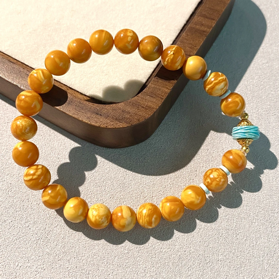 【亿轩珠宝】ZX109312丹麦花蜡单圈手串diy绿松骨羽7mm+