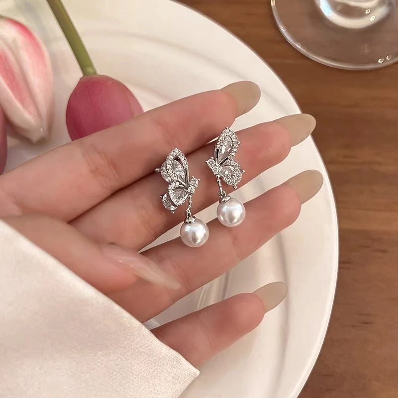 铜合金耳饰 S005独特蝴蝶珍珠银针耳环女高级感微镶耳钉精致百搭