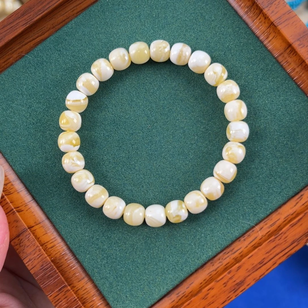 琥珀未镶嵌手串金瓷白妖花8.5m