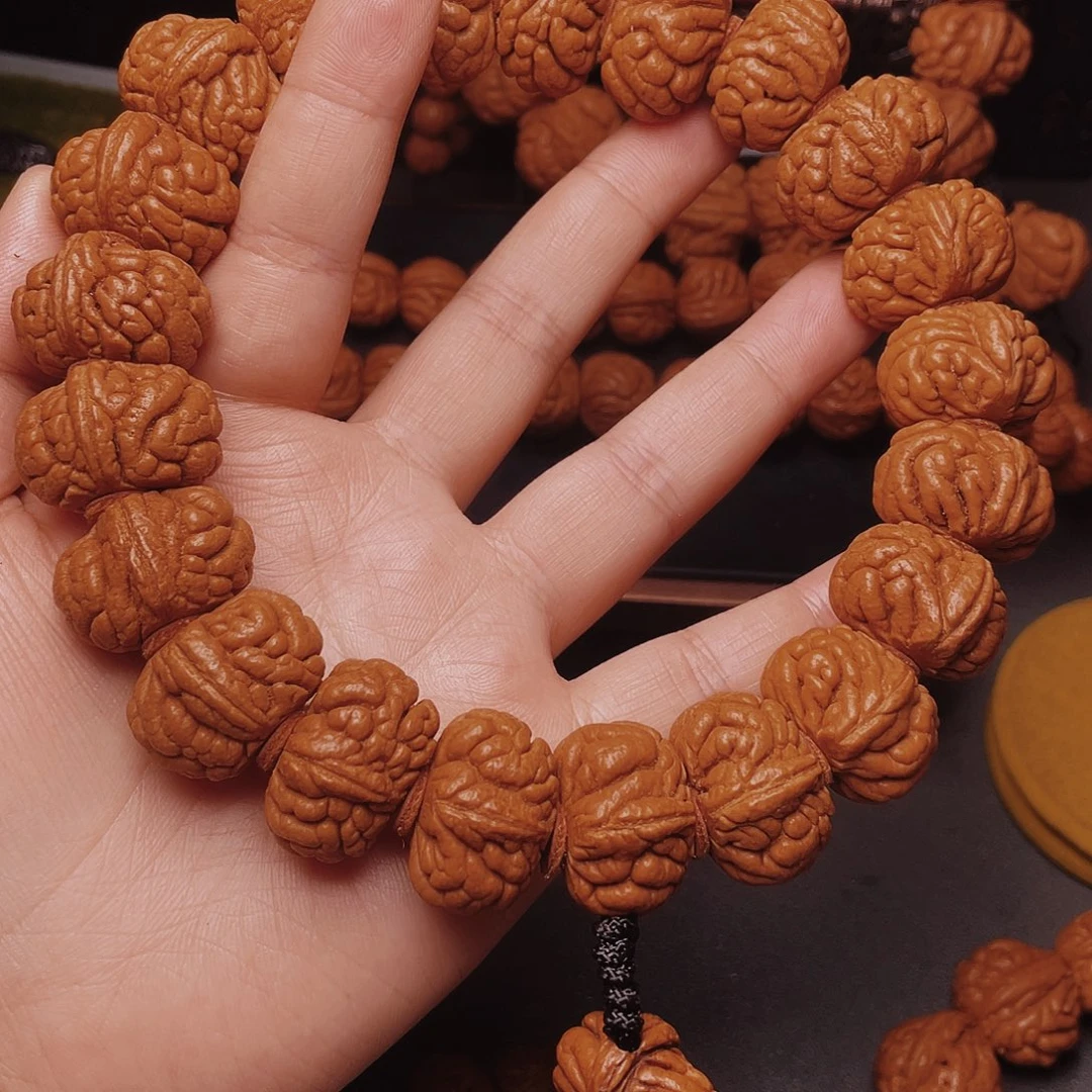 雅***年吊坠桃核桃核手串