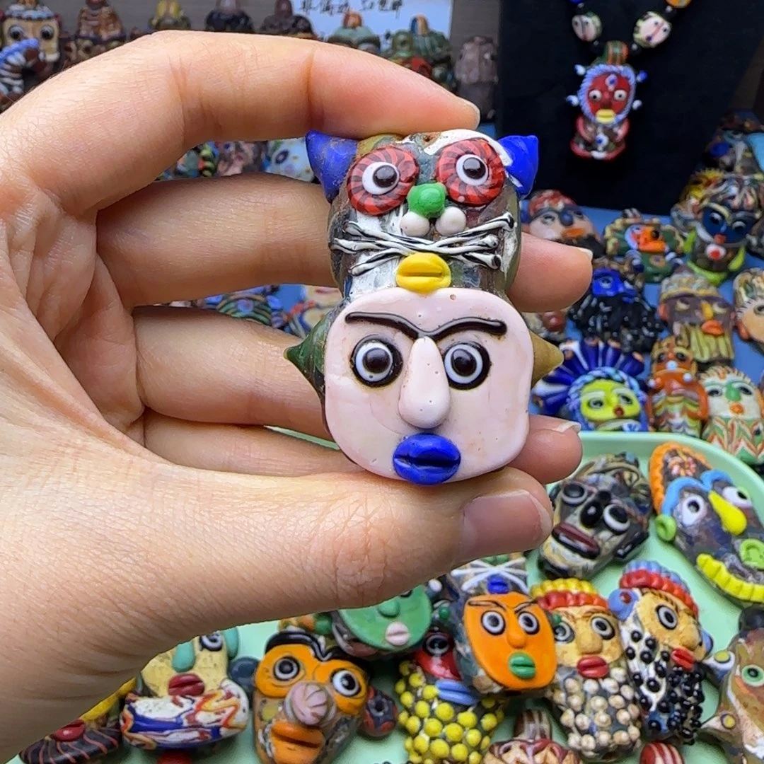 琉璃非金属人脸猫头娃