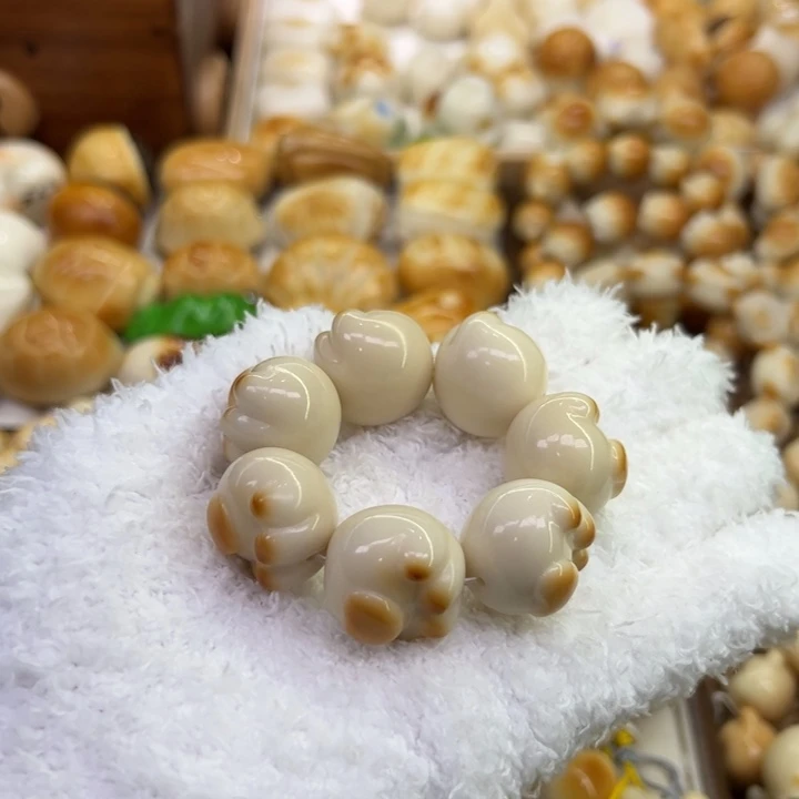 菩提根/象牙果把件86 象牙果原果雕刻炭烧小猫爪微瑕