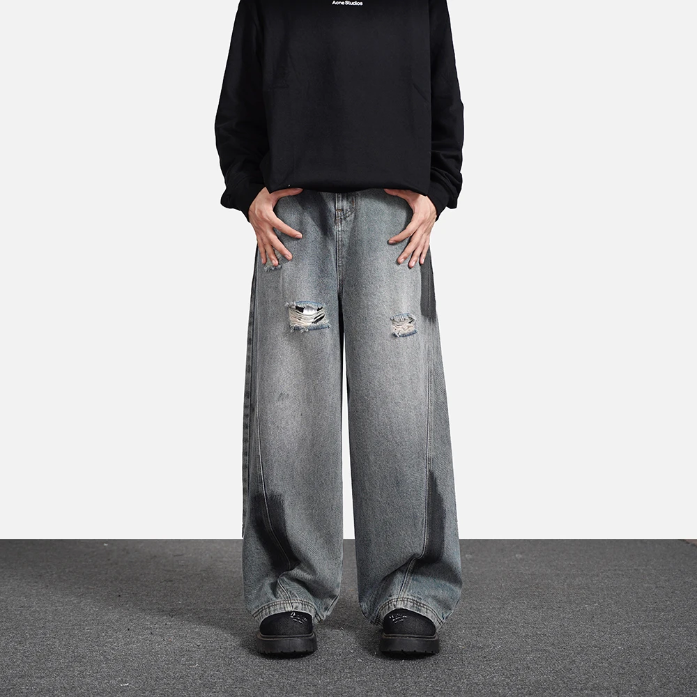 美式复古拼接解构牛仔裤男破洞撞色喷绘设计弯刀阔腿裤高街情侣裤