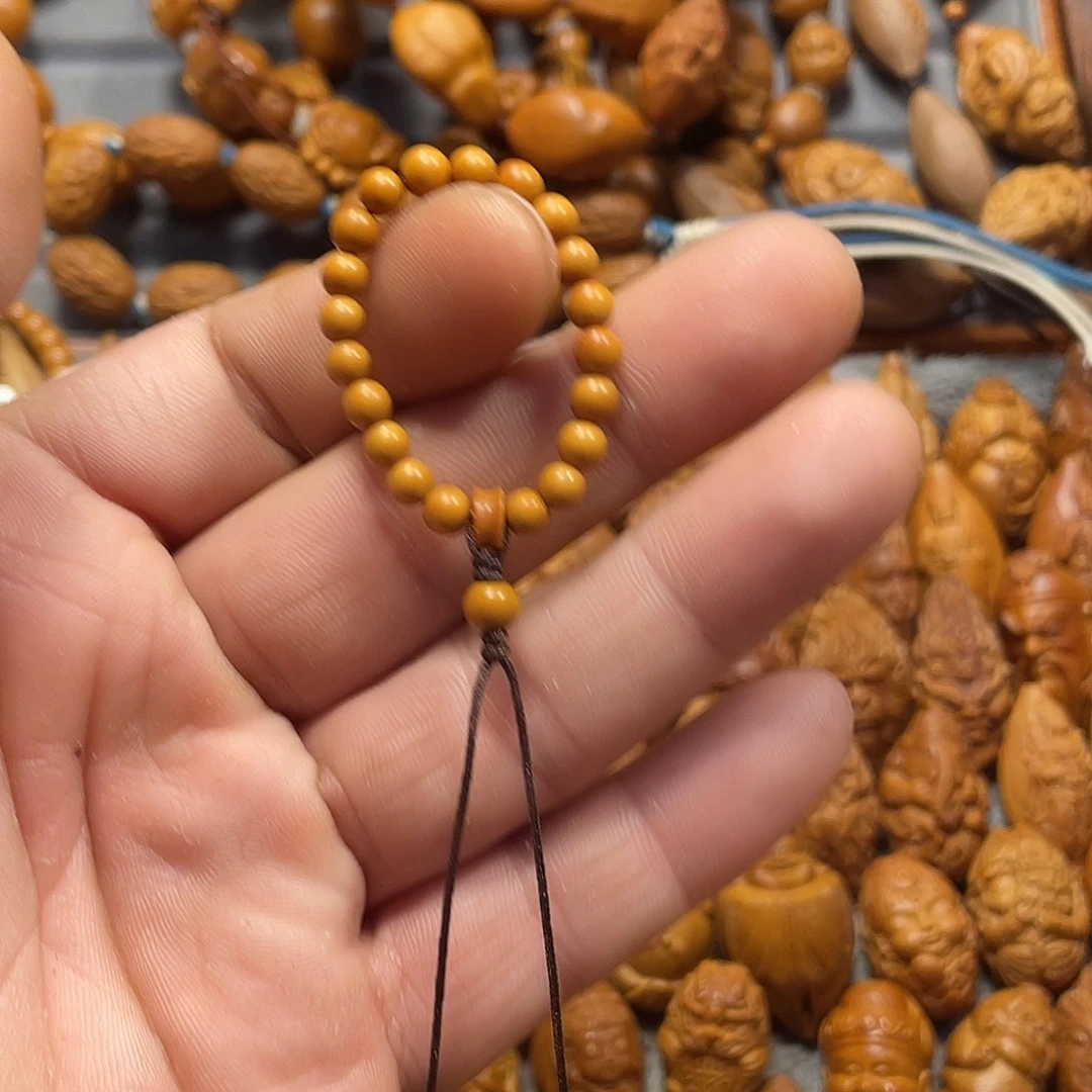 叫***门手串/手链橄榄核穿关公063