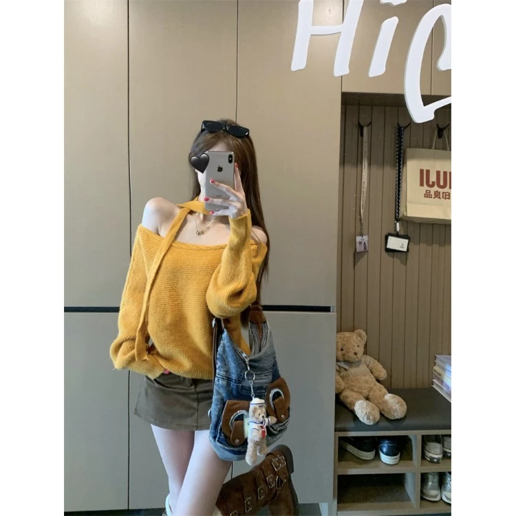 秋季2025新款设计感斜肩休闲百搭女气质上衣慵懒飘带温柔针织毛衣