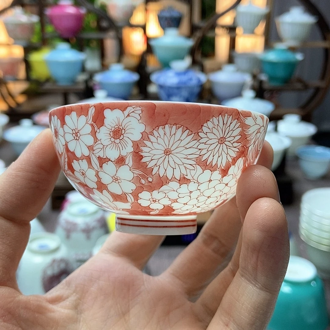 何*丽微瑕脱胎瓷高温手工超薄胎釉下红花万花主人杯