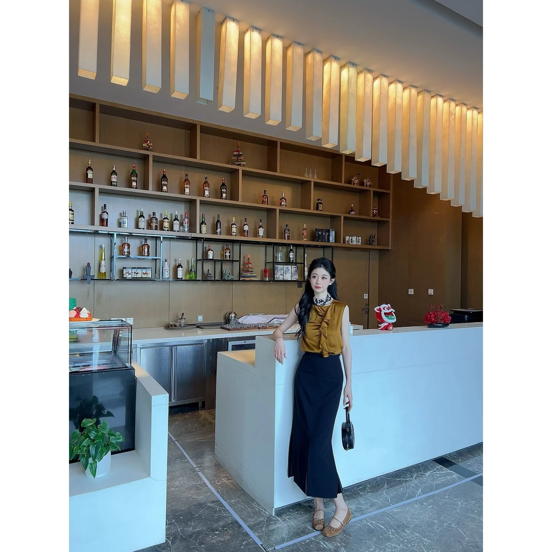 GIRDEAR/哥弟早春新款时尚无袖荷叶设计背心1301001