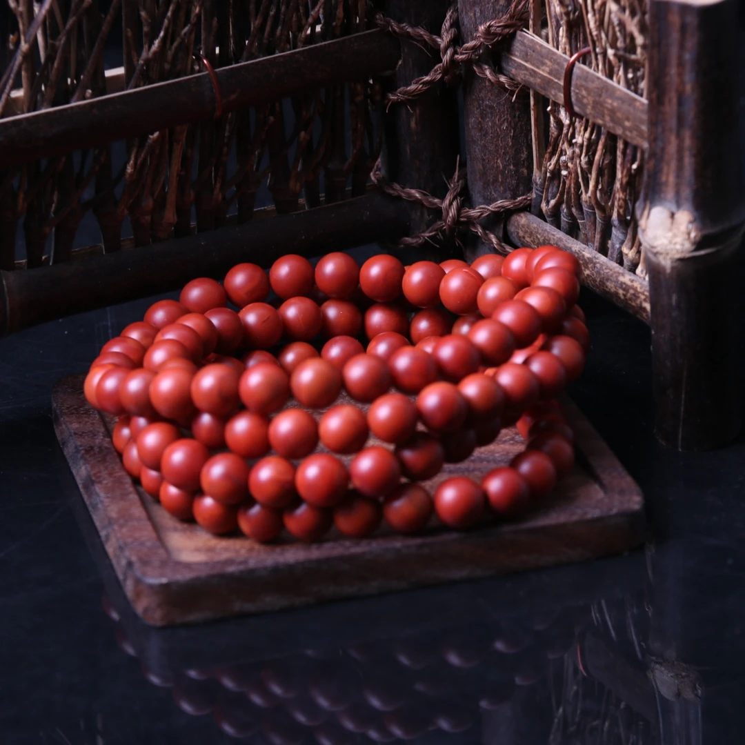 高品南红玛瑙8mm左右滴水洞柔光圆珠多圈一条n557