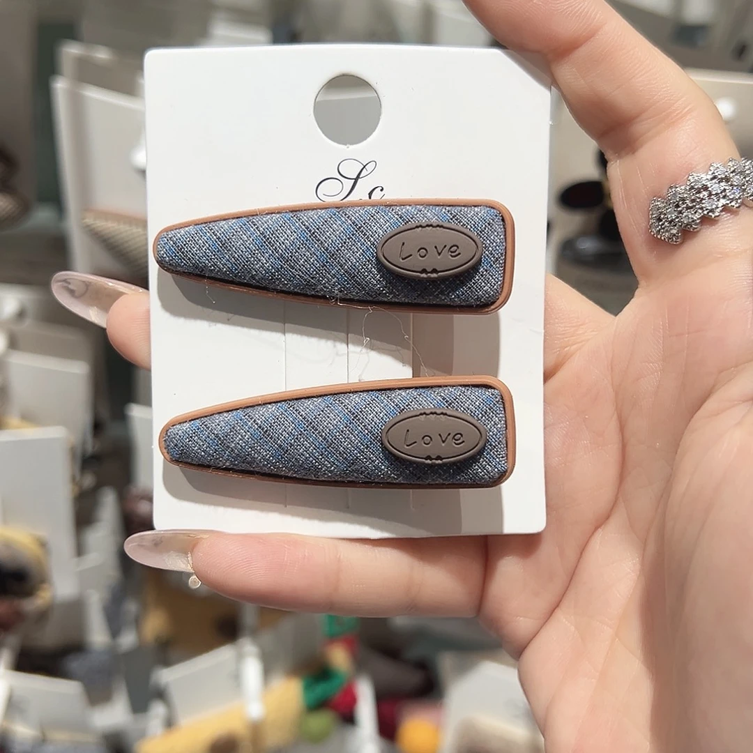 H****皮质铁合金蓝色格子鸭夹