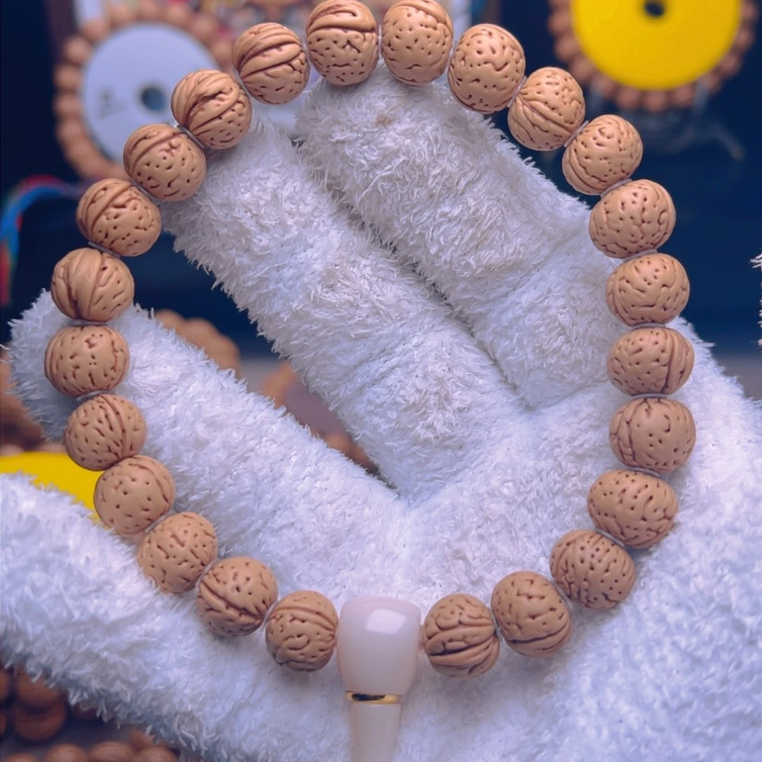 桃核手串1.2肥脐野生纽扣