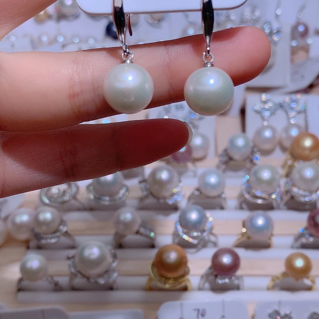 姜***皮银S925镶嵌淡水珍珠耳饰