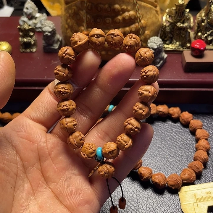 龙纹桃核雕刻双面百态