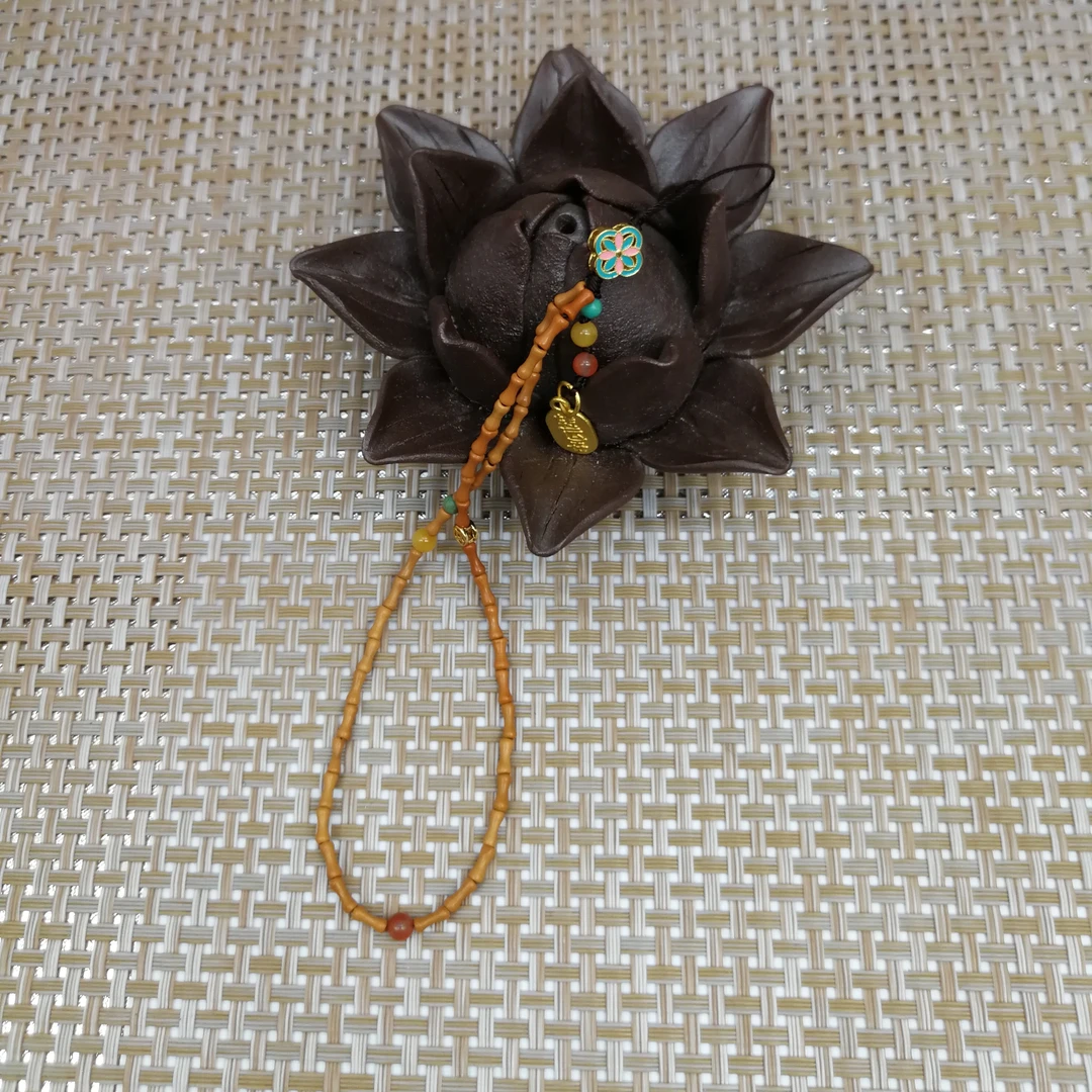 橄榄核多宝手机挂件