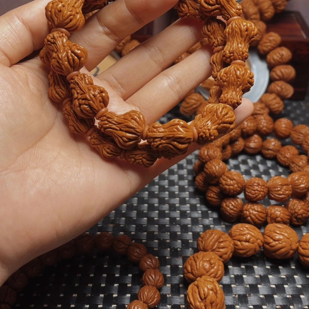 桃核手串丹****院秦岭龙纹桃核