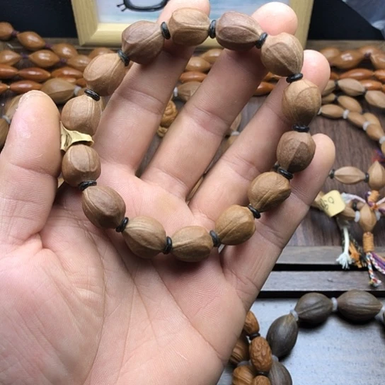 橄榄核吊坠蜜桃臀
