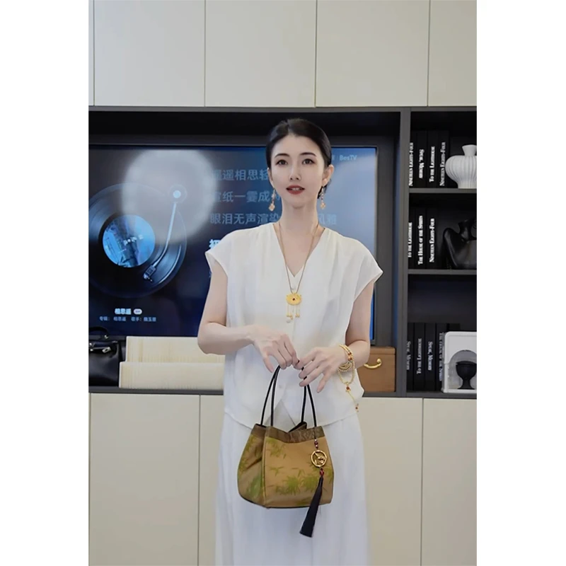 小乖逃20 V领坎肩无袖衬衫白色衬衫休闲时尚百搭夏季DD2655