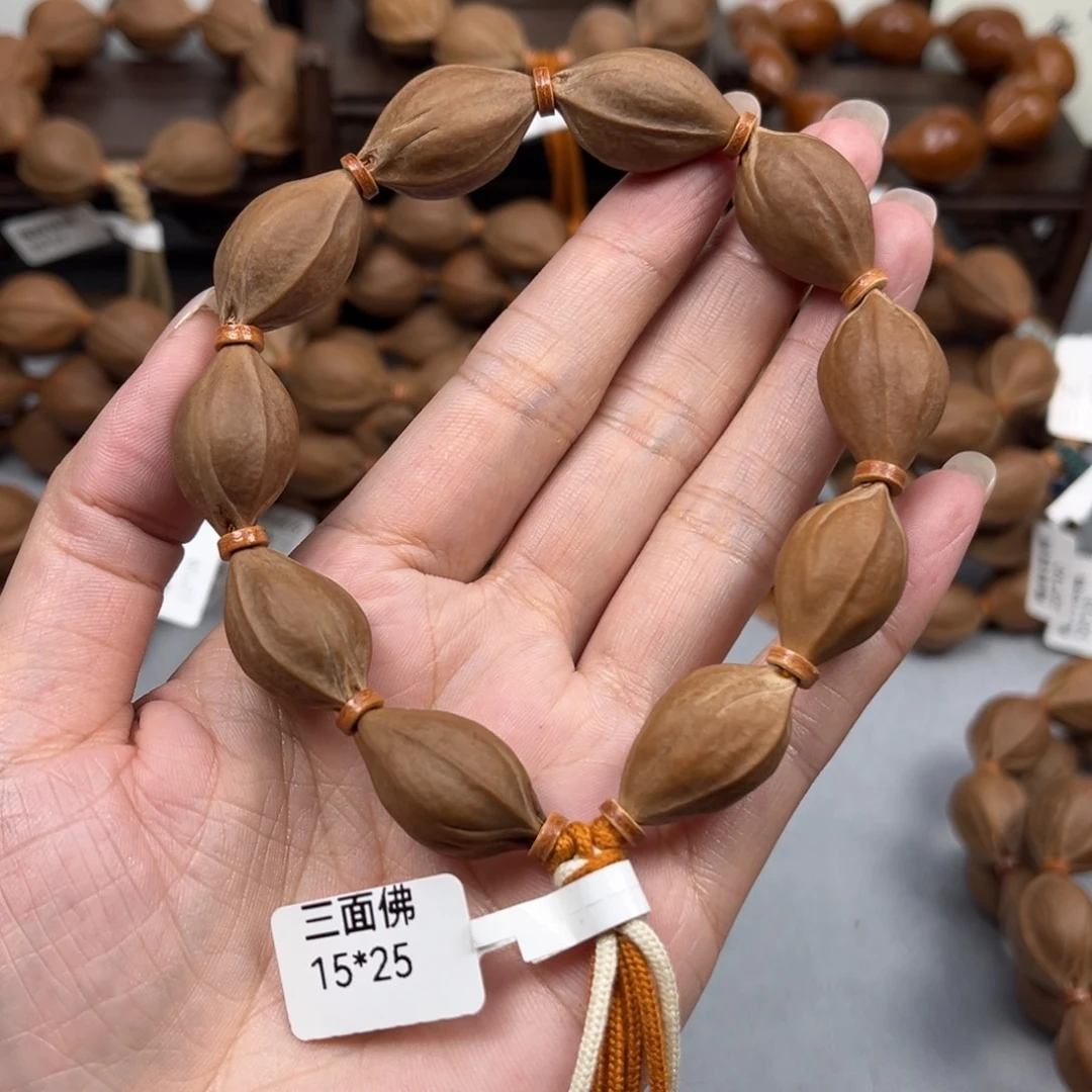 乐***新手串橄榄核梅林铁核三面佛1525