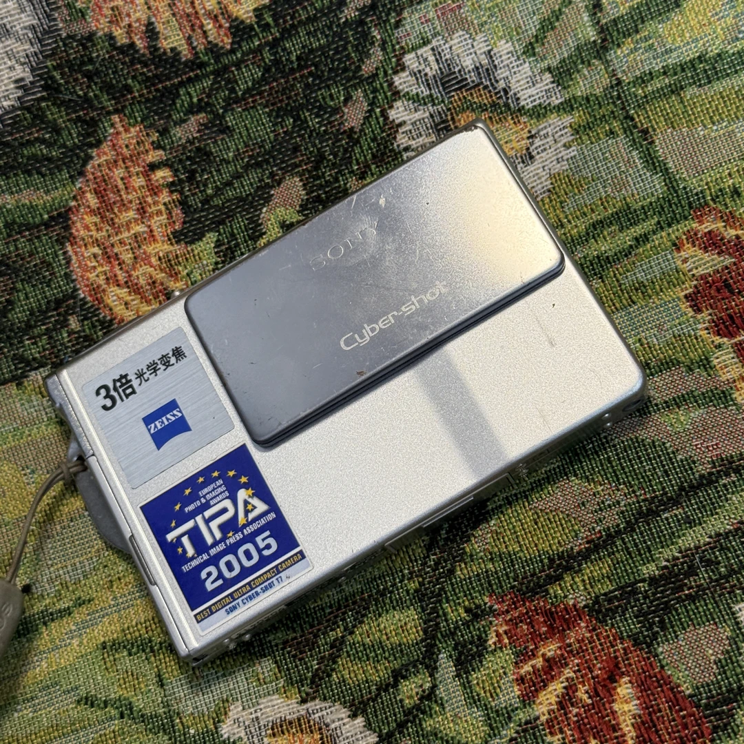 9新 Sony/索尼 t7 银色 滑盖开关 复古ccd数码相机