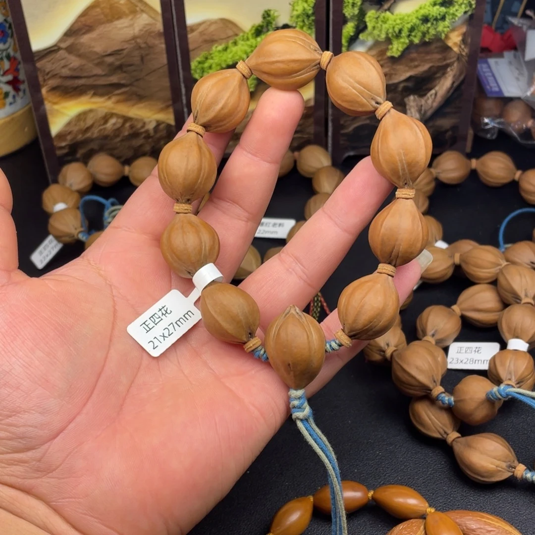 三***九手串橄榄核梅林铁正四花