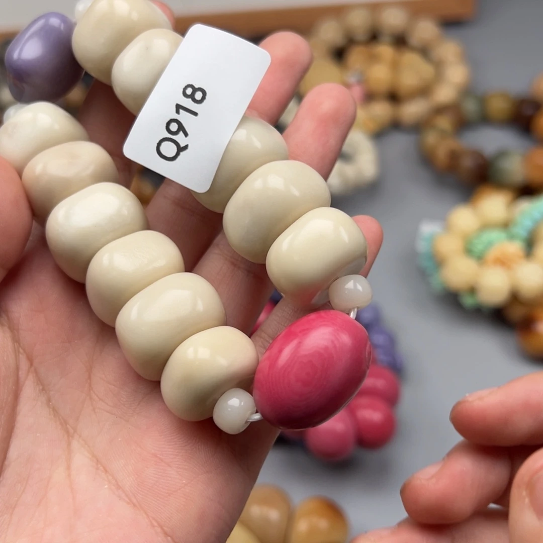 S***吊坠菩提根/象牙果Q918方扣20-23瑕疵一串