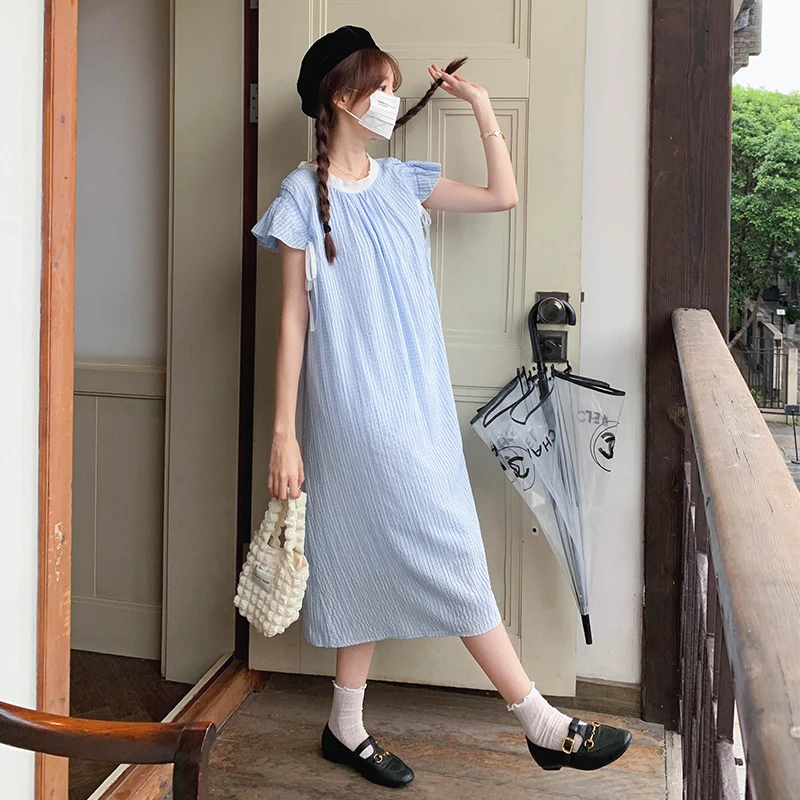 蝴蝶结蓝色格子连衣裙2025夏季新款减龄小清新独特漂亮高级感裙子