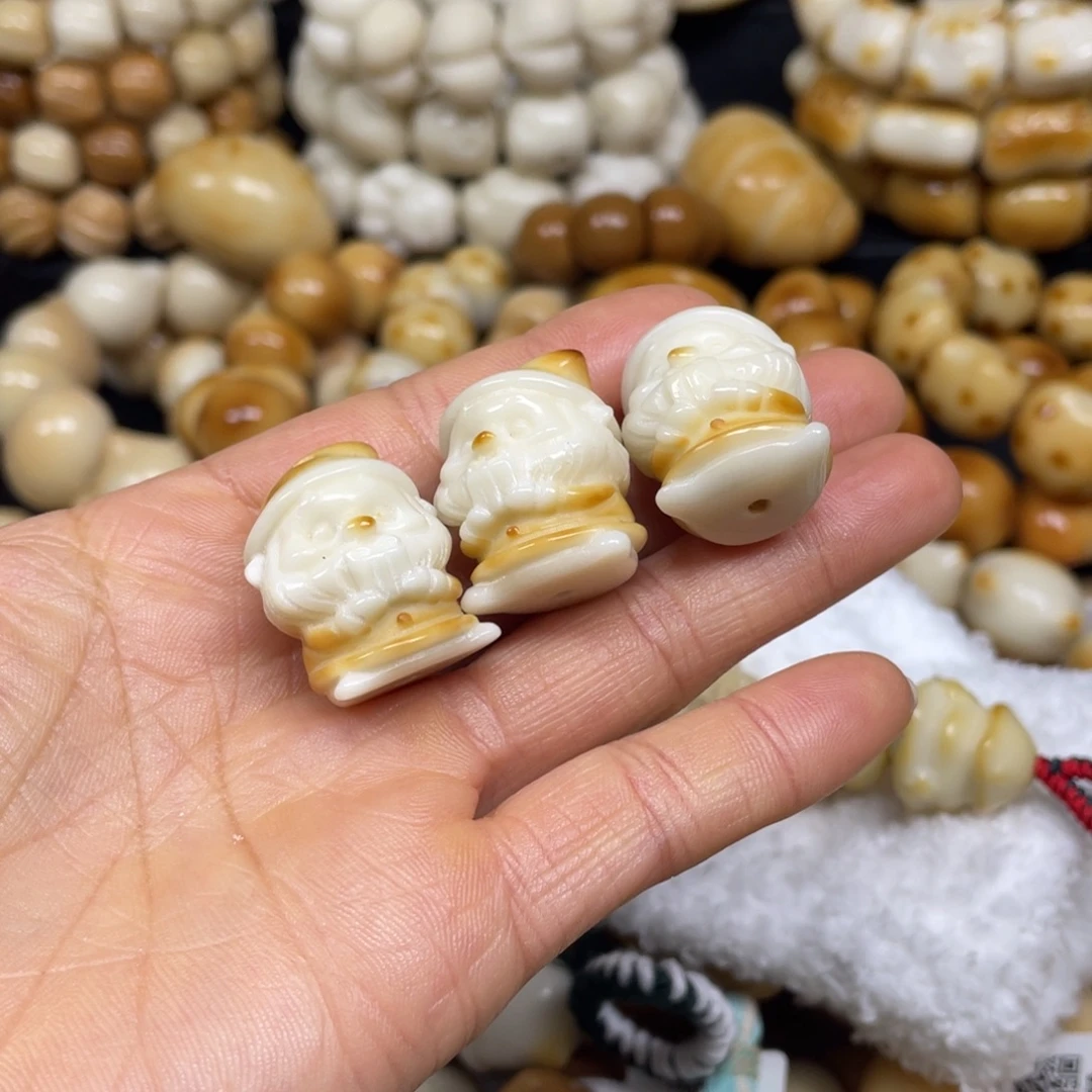 裳***虹手串菩提根/象牙果12.26:37微瑕