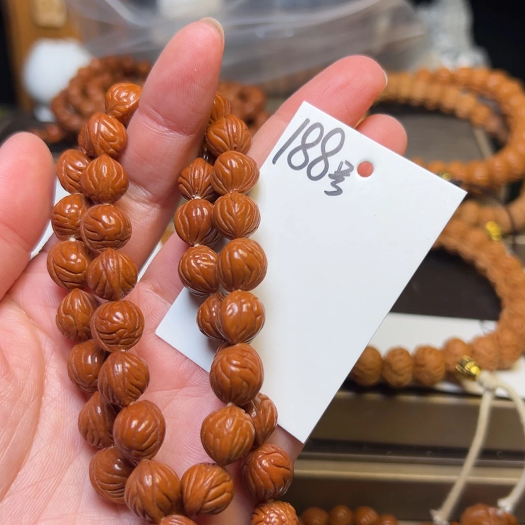 秋***桃核吊坠秦岭龙纹桃核10小奶豆手持