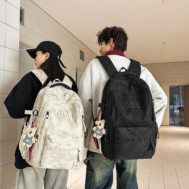 减负护脊宽背带书包初中女生高中生男款双肩包大学生旅行户外背包