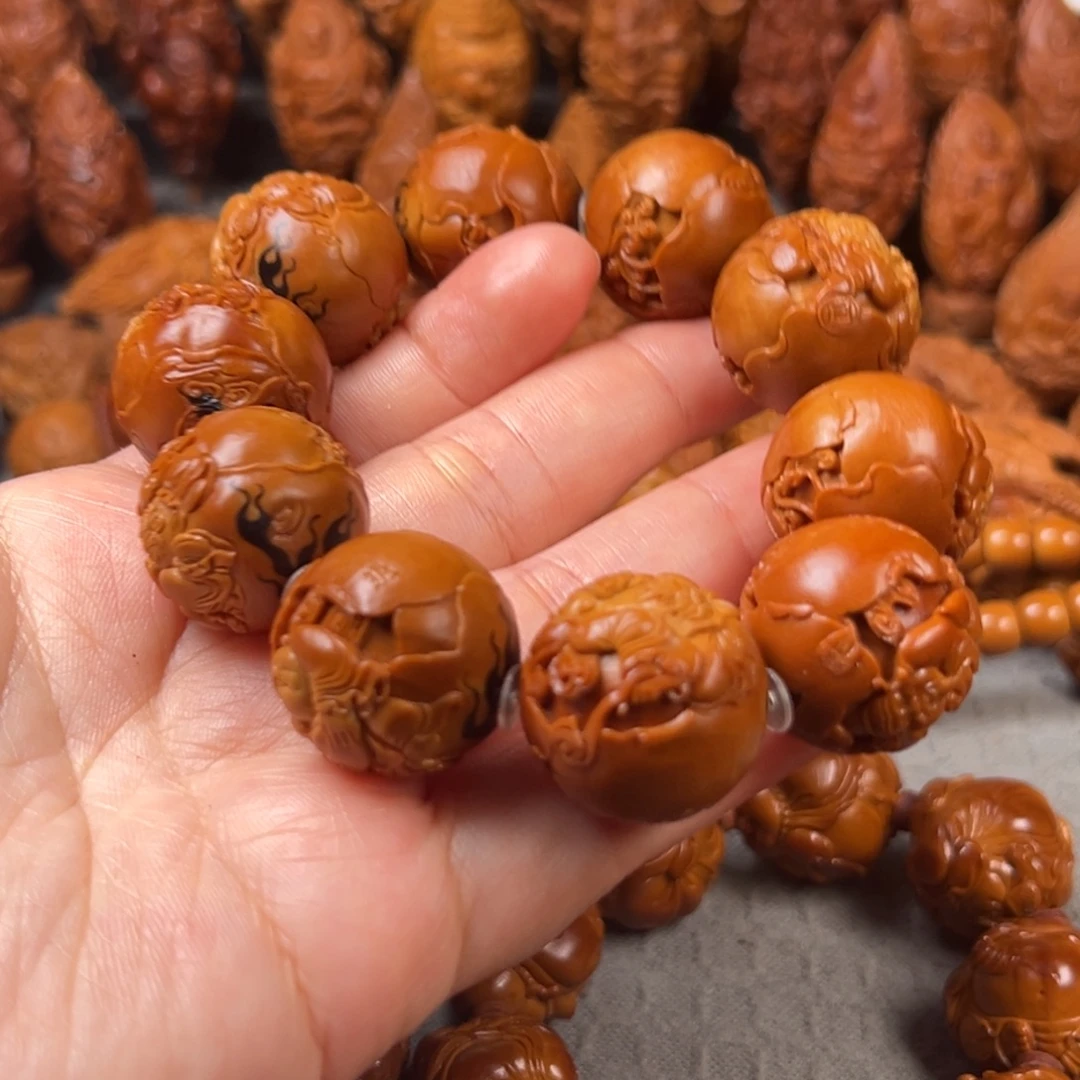 跟***别橄榄核手串/手链核雕