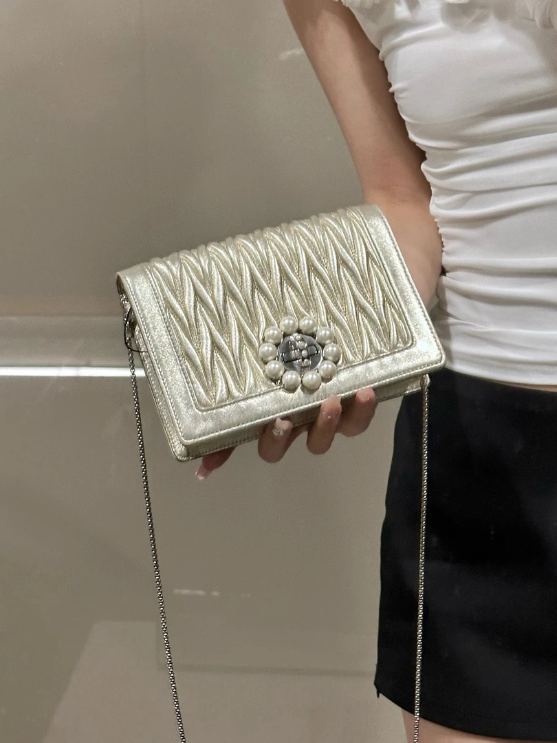 95新 MIU MIU/缪缪 miumiu 金色太阳花斜挎包