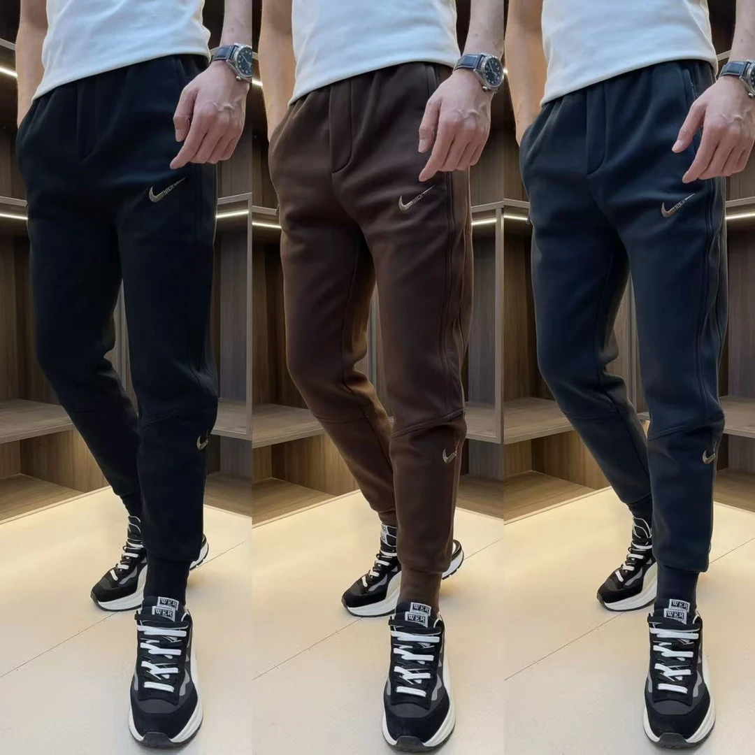 冬季百搭加厚加绒拉链兜金标刺绣束脚休闲裤.555