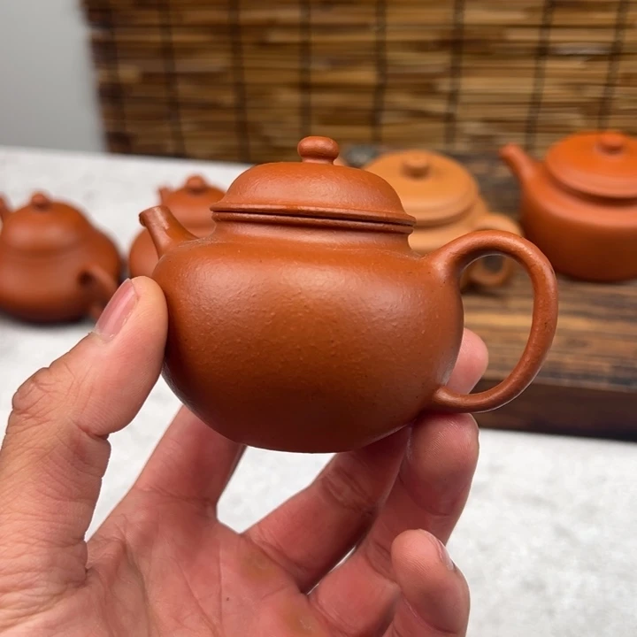 紫砂茶壶范***腾生砂朱泥掇只