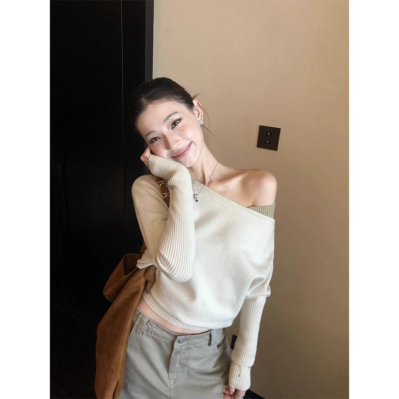 毛衣女秋冬新款上衣撞色斜肩拼接长袖气质时尚纯欲风慵懒针织衫