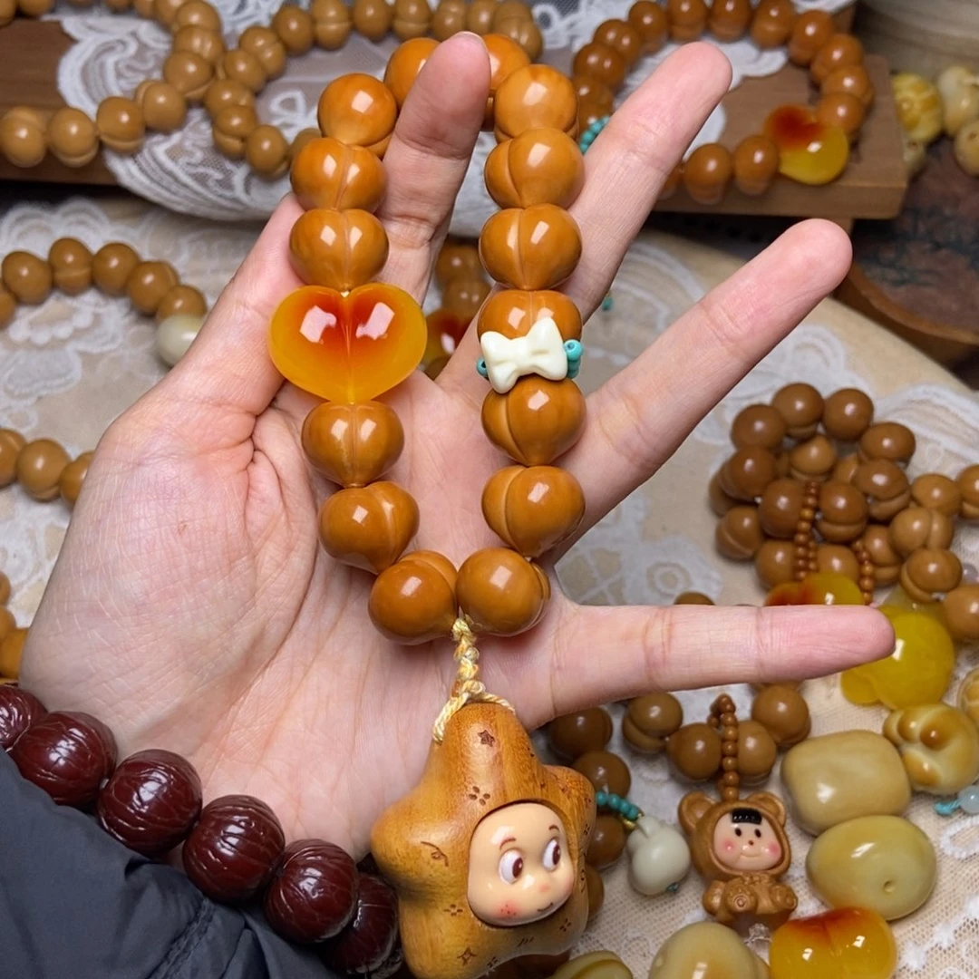 吊坠猴头核桃屁桃玻璃底卡16