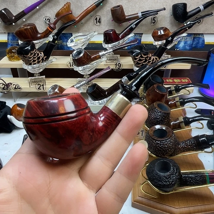 浅*烟斗是用铁棍在