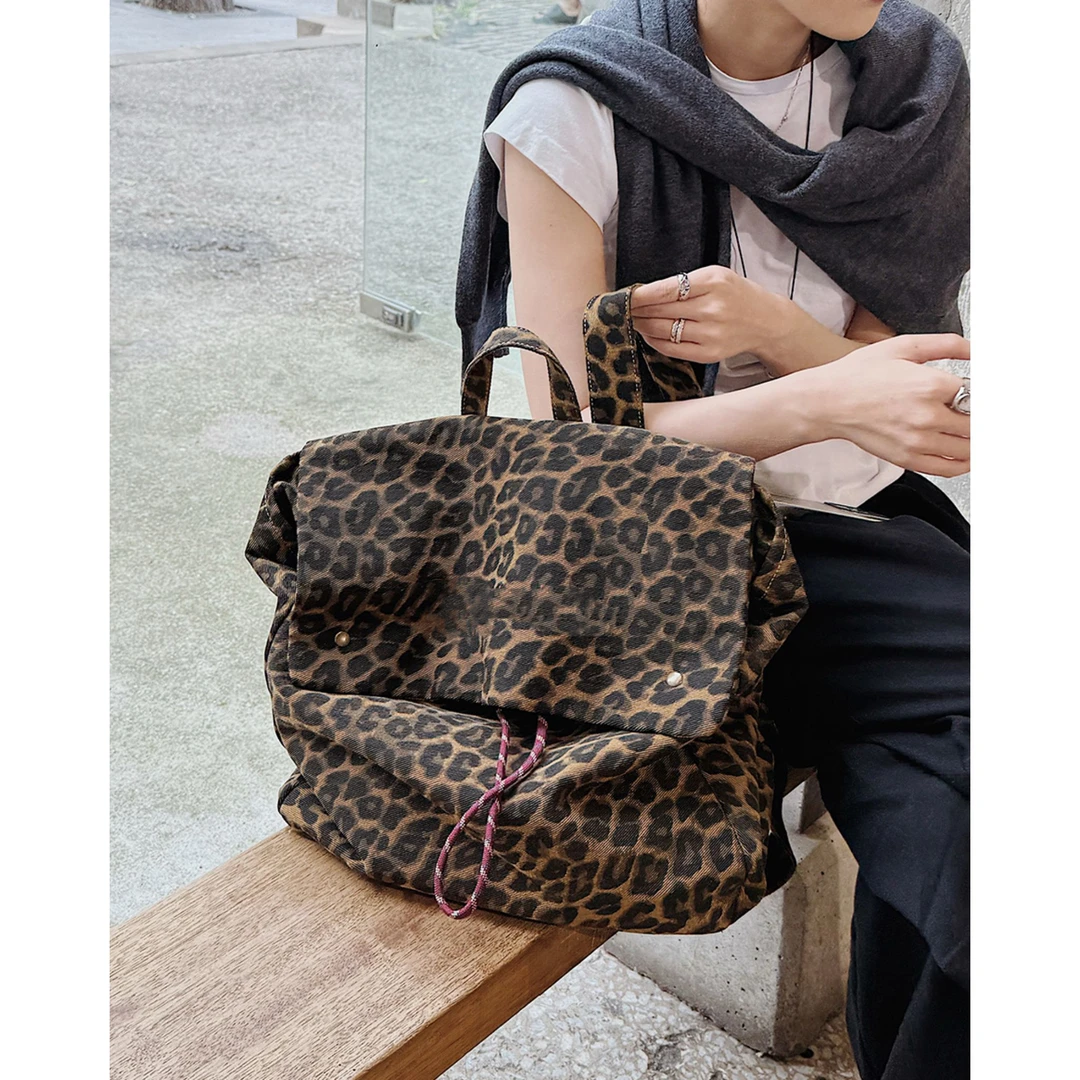 时尚个性豹纹帆布包2025新款高级感大容量通勤旅游双肩包背包书包