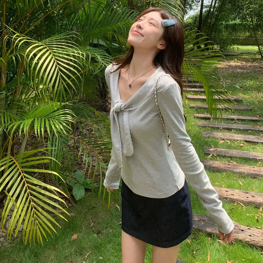 溪溪靓衫 条纹蕾丝拼接蝴蝶结长袖T恤女秋季修身打底内搭上衣