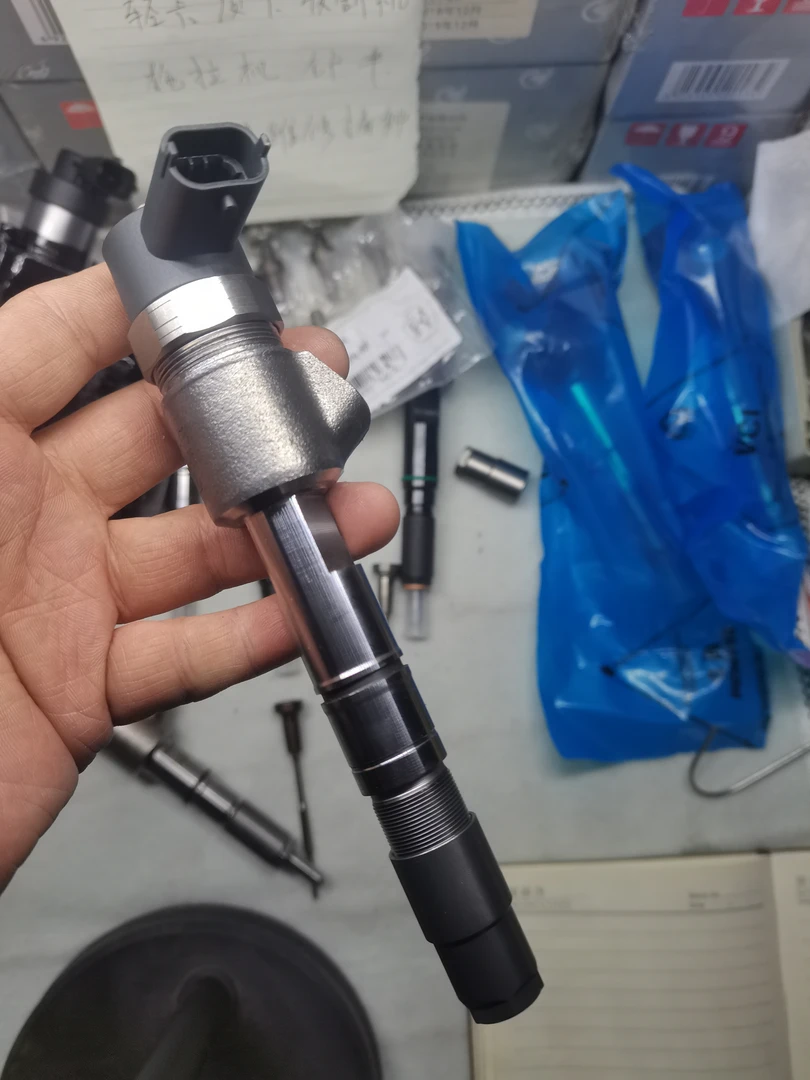 电喷喷油嘴五十铃493喷油器新壳体新电磁阀新压帽一套