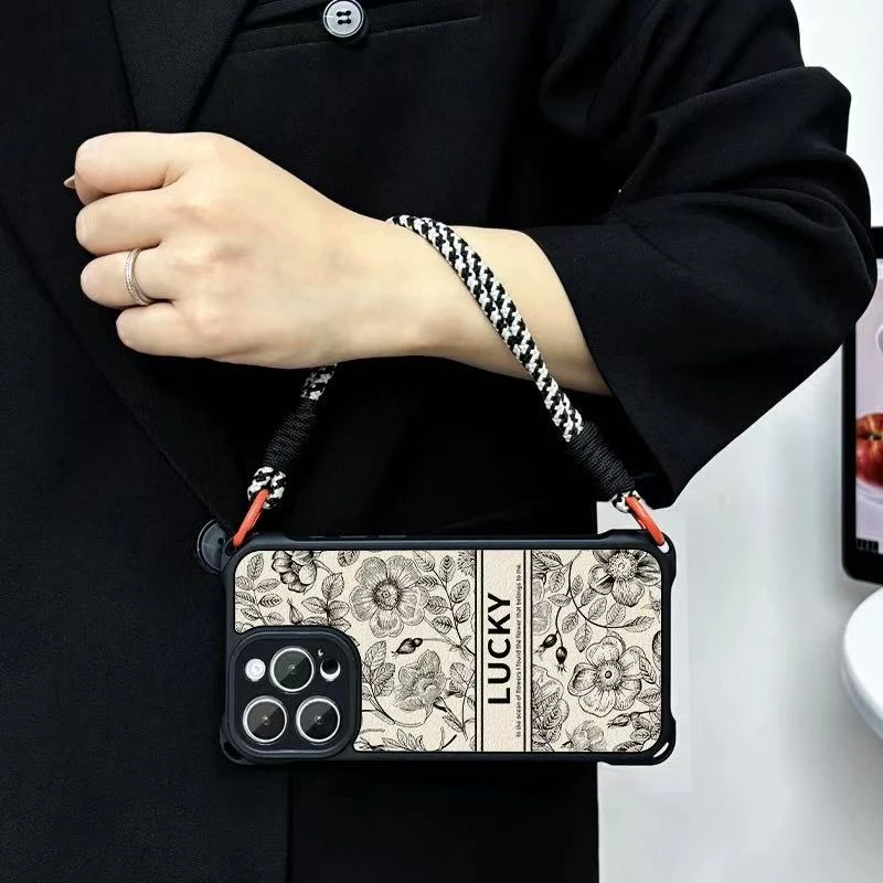 潮牌新款四角挂绳贴皮网红线条花朵手机壳防摔全包创意卡通可爱