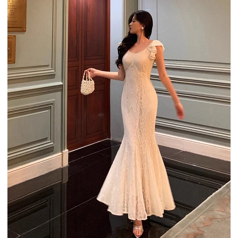 601白色蕾丝鱼尾连衣裙女2024夏季新款法式小众气质收腰长裙3910