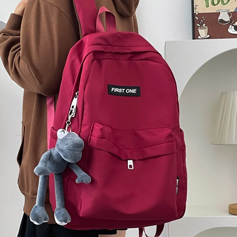 书包初中生高中生大学生ins纯色韩版简约百搭大容量高颜值双肩包