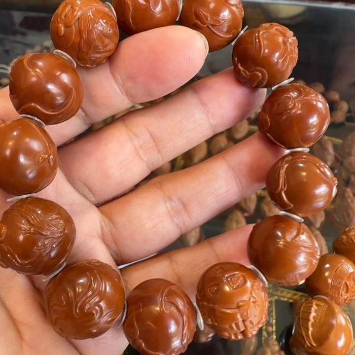 你***、橄榄核把件无相佛