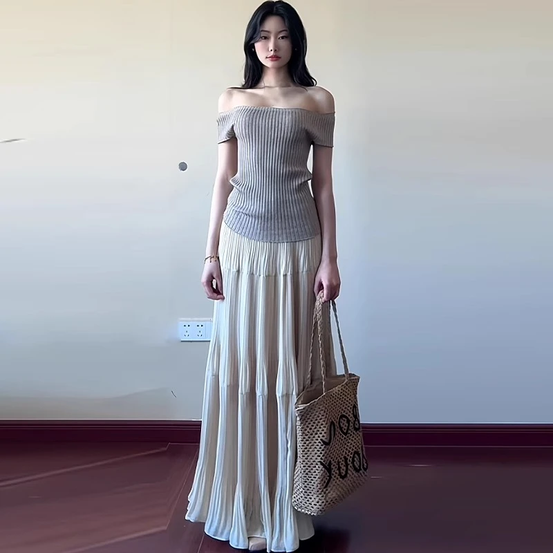 杏色半身裙女夏季休闲宽松显瘦伞裙温柔小个子百搭a字压褶中长裙