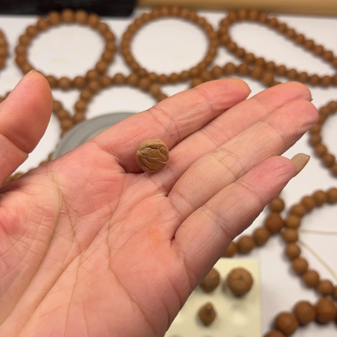 吴***二吊坠猴头核桃半核