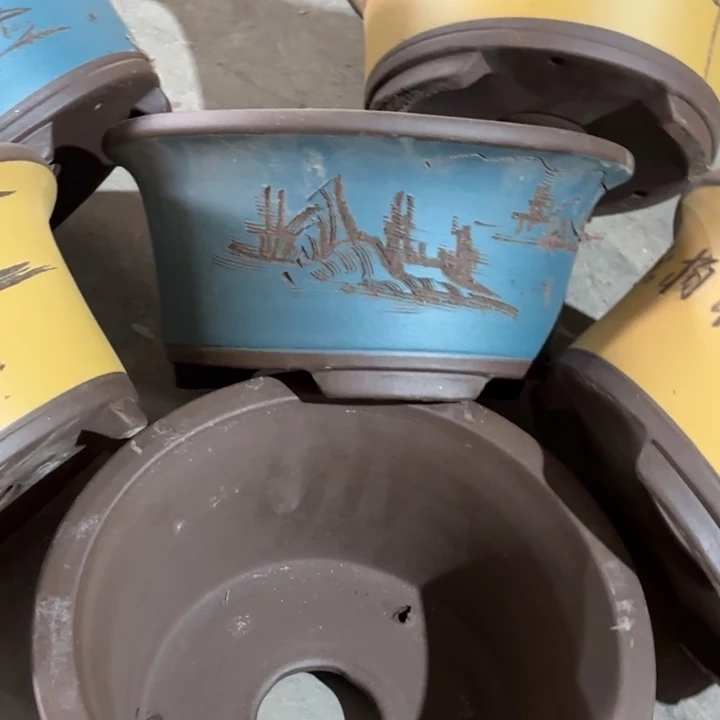 紫砂花盆100-6。