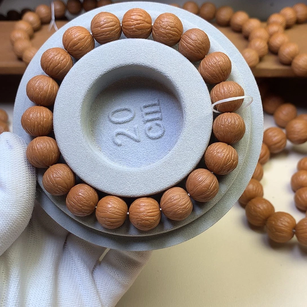 豆****吊坠猴头核桃13凤羽全品手串同尺