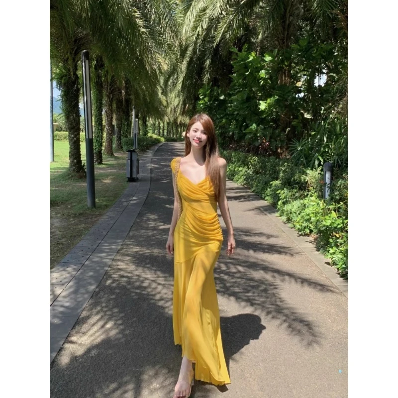 泰国旅游度假拍照沙滩裙纯欲性感网纱斜肩吊带连衣裙修身包臀长裙