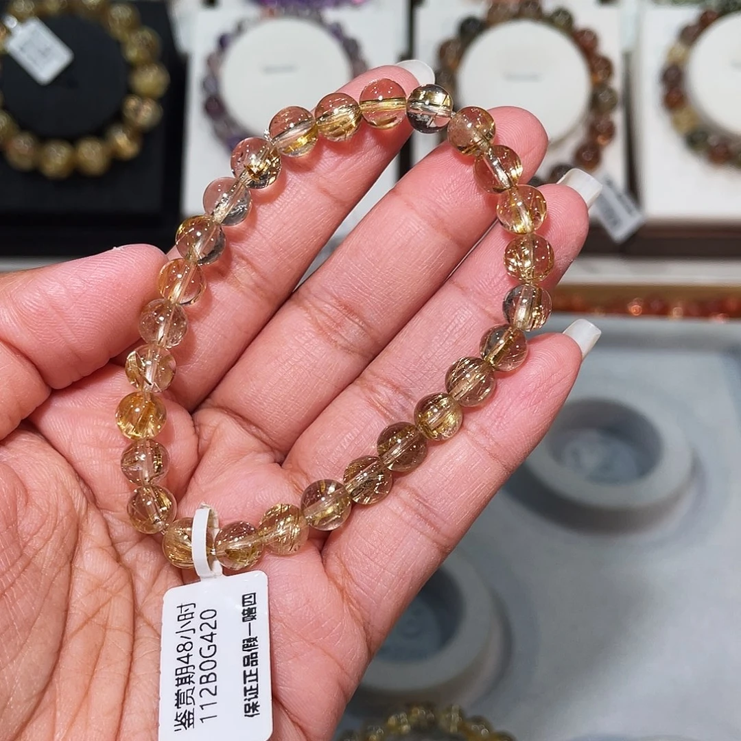 找***律发晶手串未镶嵌已实名钛金7m