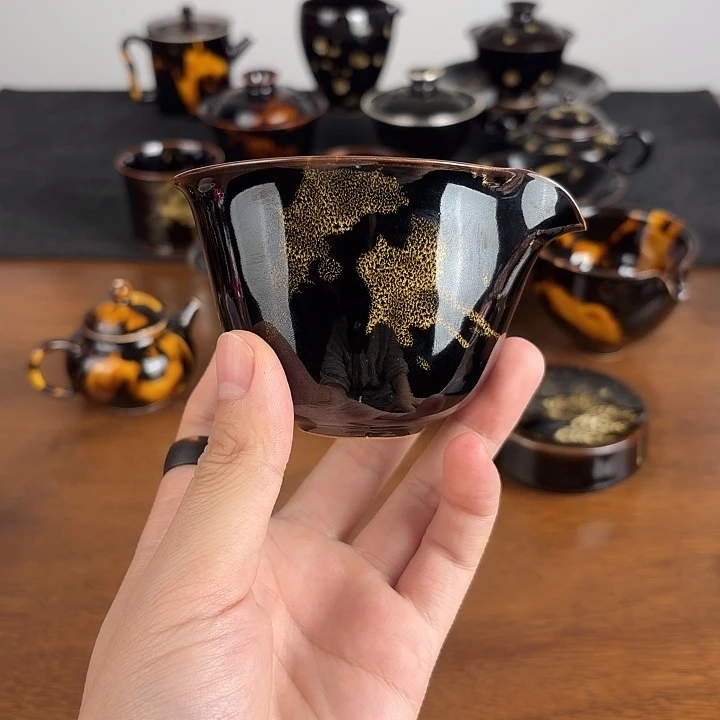 瓷洒彩鹧鸪斑椭圆公道杯